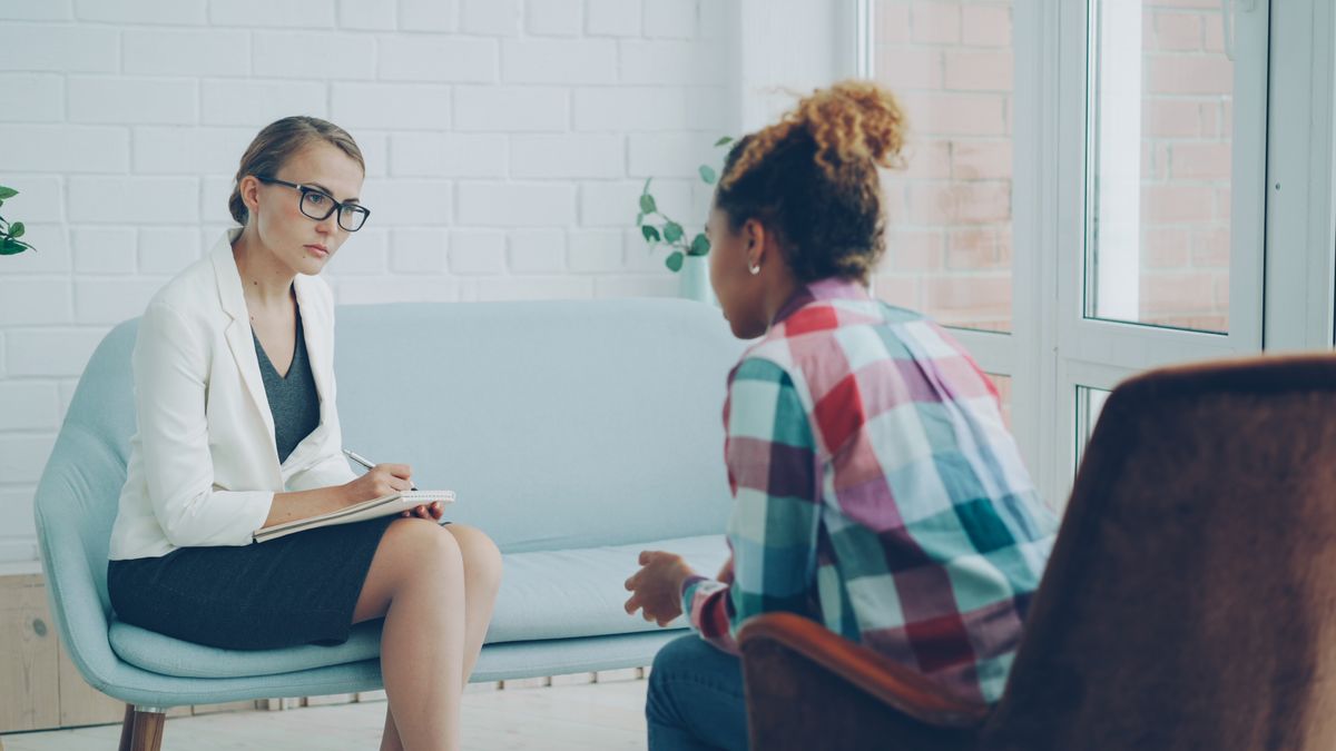 Therapist listening attentively during a counseling session